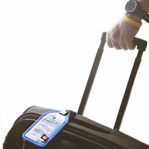 XSProject luggage tag on a suitcase